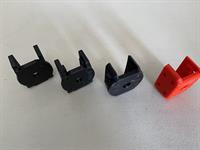 This picture shows the progression of the design. The red one was printed in PETG.